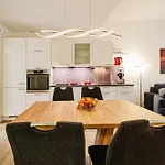 Prora - Familienfreundliche Ferienwohnung mit Terrasse, Waschmaschine und Gemeinschaftssauna - Ostseebrise Binz